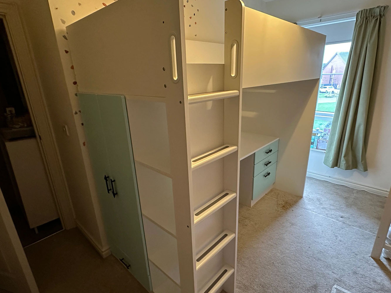 High bed with storage and desk